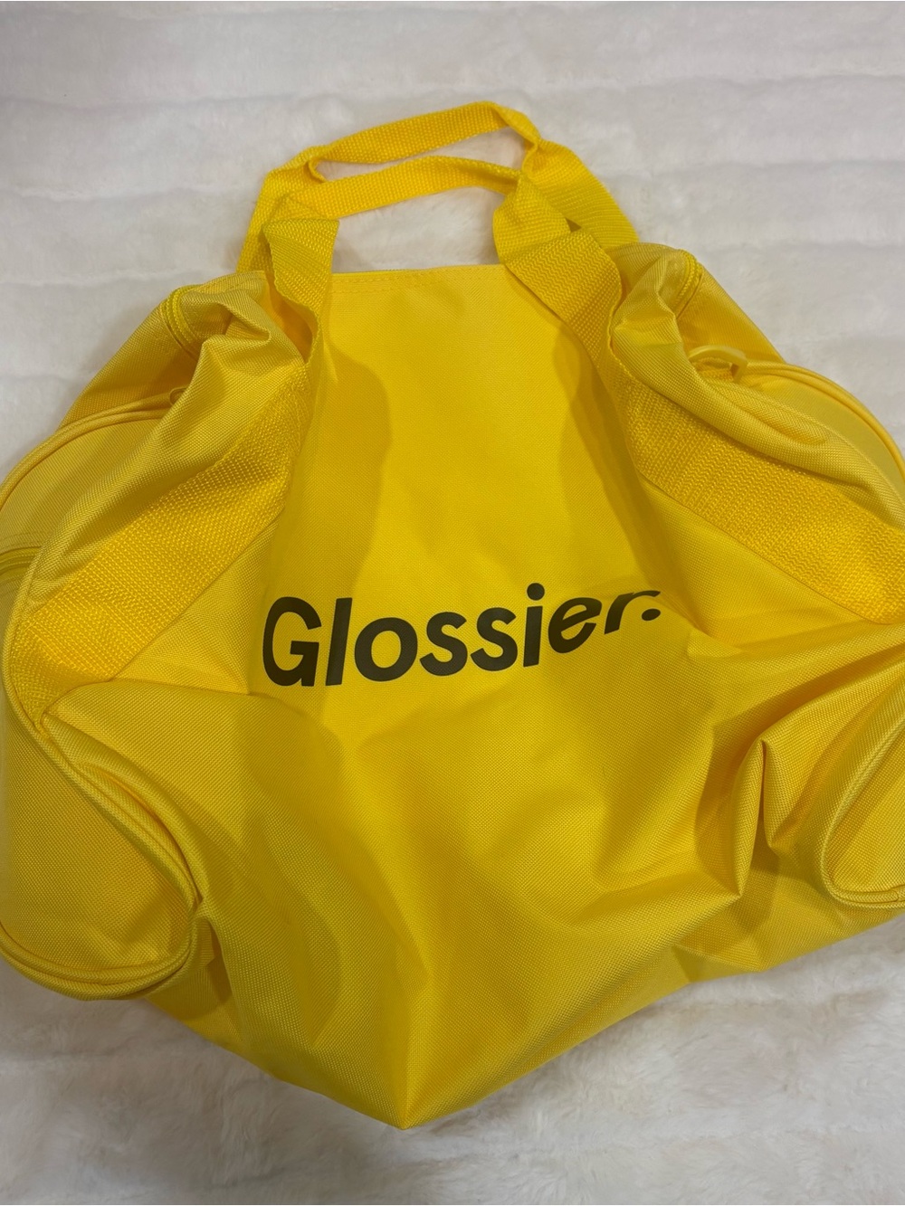 Glossier Vibrant Yellow Logo travel bag